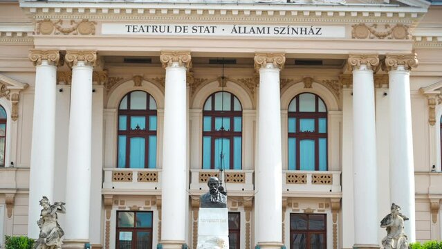 View of the Ede Szigligeti bust and State Theatre entrance in Oradea downtown, Romania