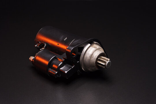 old black starter for starting the engine in a car after repair