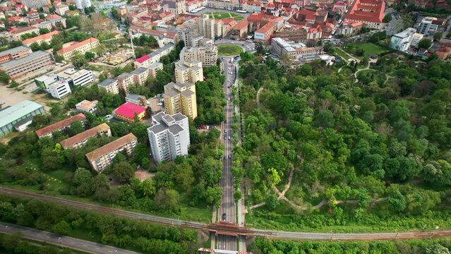 Aerial drone view of Timisoara, Romania. View of the city downtown, Unirii Square with multiple historical and residential buildings, greenery