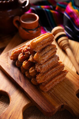 Churros. Fried wheat flour dough, a very popular sweet snack in Spain, Mexico and other countries where it is customary to eat them for breakfast or snack accompanied by hot chocolate or coffee.