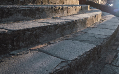 Detail of rounded stone stairs.
