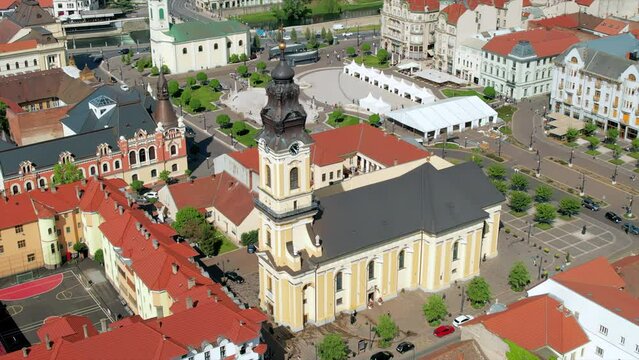 Areal drone view of the Cathedral of St. Nicholas in Oradea downtown, Romania. Unirii Square on the background