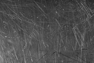 Texture of scratched metallic surface as background, closeup