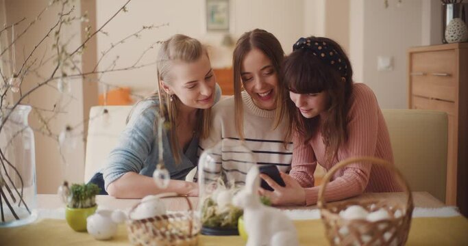 Sisters take selfies during Easter holidays and send them to friends and family.