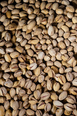 Pistachios background. Pistachio nuts close up.