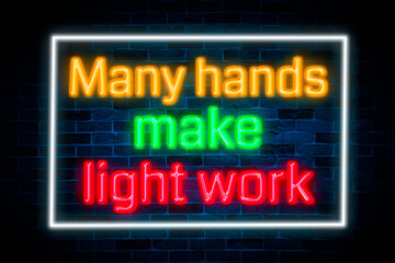 Many hands make light work neon on brick wall background.