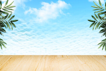 beach , Empty wooden table and palm leafs with party on beach background blurred. Concept Summer, Beach, Sea, Relax, Party.