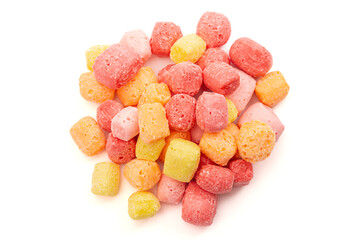 Freeze Dried Rainbow Flavored and Pastel Colored Chewy Candy Squares on a White Background