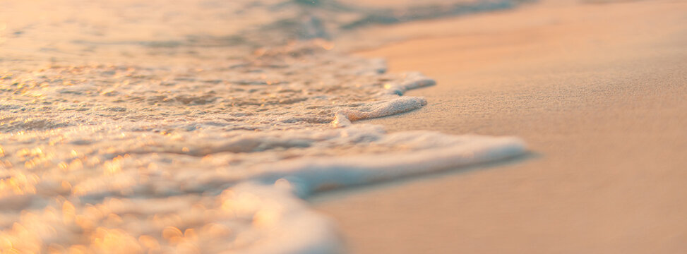 Closeup abstract sea sand beach. Soft surf waves splash panoramic freedom. Inspire tropical Mediterranean seascape. Warm gold sunset calm tranquil relaxing sunlight summer. Dream vacation background