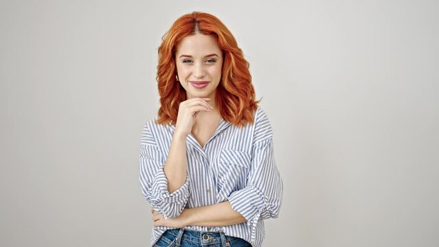Young redhead woman smiling confident standing over isolated white background