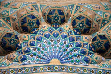 Fotobehang beautiful peacock pattern in wall © oybekostanov