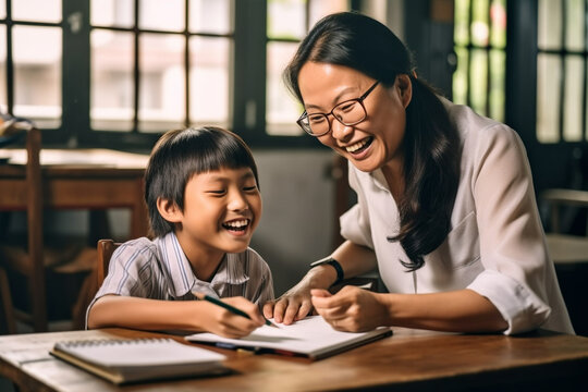 Smiling Asian teacher sitting at a desk and helping a student with homework, asian teacher, school, natural light, affinity, bright background Generative AI