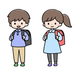 並んで立つ小学生の女の子と男の子