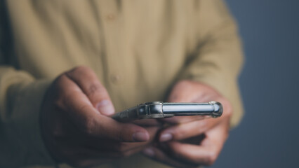 Man hand using mobile smartphone. copy space.