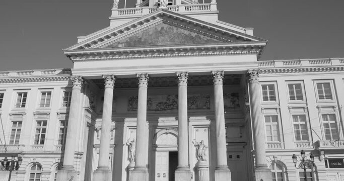 Front Facade View Of The Church Of St. James On Coudenberg And Bell Tower During Daytime In Brussels, Belgium. black and white, tilt-down