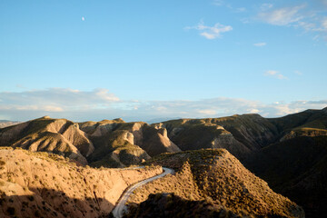 Fototapeta na wymiar Panoramic view of the eroded mountains of the Gorafe desert in Granada
