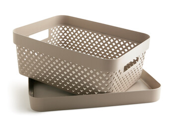 Plastic basket with lid on white background