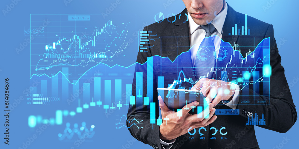 Poster man using tablet computer with financial diagrams
