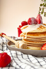 stack of pancakes with syrup