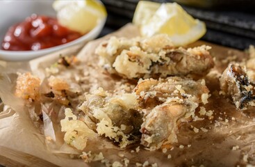 Crispy Delights: Close-Up of Deep-Fried Oysters in 4K Resolution