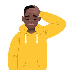 A black young guy with glasses is holding his forehead in sadness. Sad african successful confident boy in yellow hoodie.