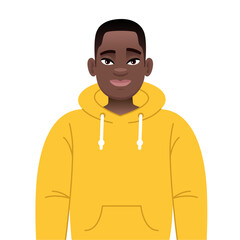 Portrait of a happy black young guy with glasses. African successful confident boy in yellow hoodie.