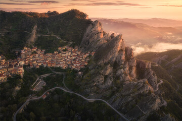 Aerial view of Castelmezzano village at sunrise in Apennines Dolomiti Lucane, Basilicata, Italy