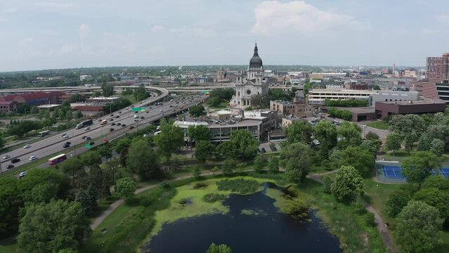 Aerial wide push-in shot of the Basilica of Saint Mary in Minneapolis, Minnesota. 4K