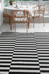Stylish striped carpet in interior of modern kitchen