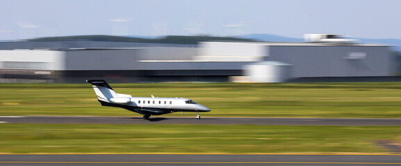 a plain private jet takes off speed panorama