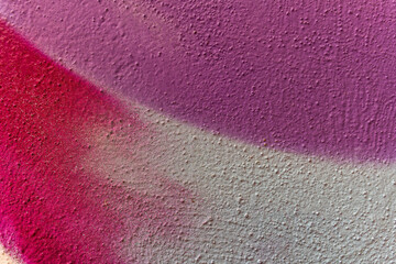 underground art of colorful aerosol graffiti on a street city wall , bright drawing of a modern urban painter