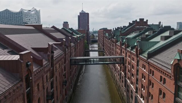 Drone shoot of The Speicherstadt in Hamburg, Germany, it is the largest warehouse district in the world where the buildings stand on timber-pile foundations, oak logs, in this particular case. 