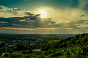 Sunset in the clouds from the green mountain