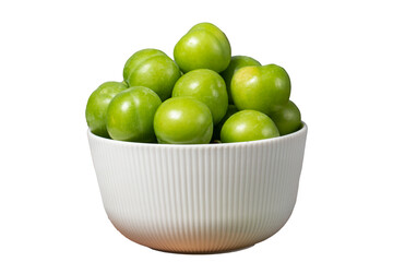 Green plum in bowl. Organic farm products. Sweet or sour plum isolated on white background