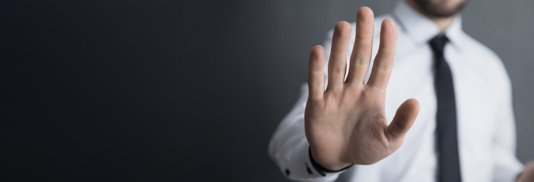 man hand stop sign