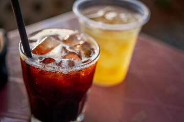 Delicious ice coffee americano on table.