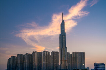 Fototapeta premium Sunset at Landmark 81 with warm sunshine