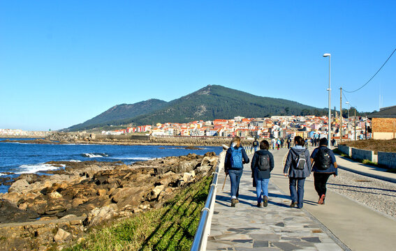 Pilgrims on the Portuguese coastal road to Santiago de Compostela, Galicia