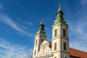 View at the towers of the Inner-City Parish Church (our lady´s church) in Budapest in spring against blue sky