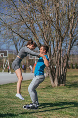 Sports friends having fun in the park