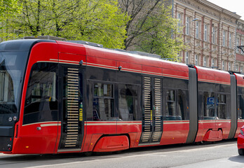 public transport red trams in Poland - obrazy, fototapety, plakaty