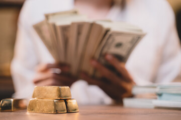 Background of one person success in your life. She are rich. Women have money, cash, gold.
