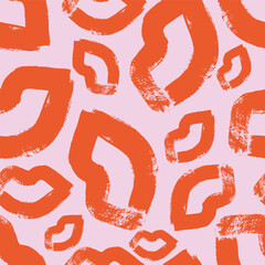 Seamless vector pattern with lips on pink background.