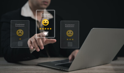 Concept of satisfaction and customer service. : Business man use use laptop touching or pressing the virtual screen Five score and five star to show satisfaction with the service or give rate.	