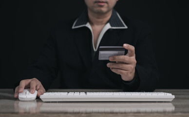 Concept e banking or e commerce : business man using his Laptop for payment by wallet app technology or digital money transfer after his shopping something by application .	