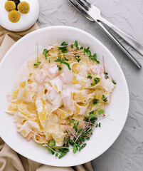 tagliatelle pasta with salmon with parmesan in cream sauce