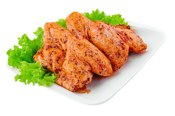 pile of marinated chicken wings on plate