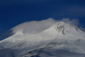 View of the evening Mount Elbrus with a blanket of clouds