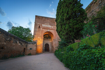 Fototapeta na wymiar Gate of Justice (Puerta de la Justicia) at Alhambra at sunset - Granada, Andalusia, Spain