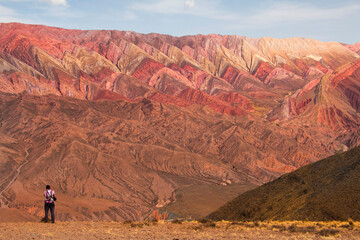 Tourist photographing the Hornocal - Catamarca Argentina